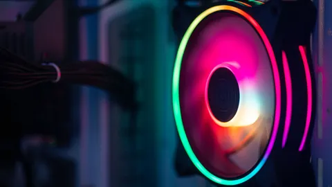 Close-up of an RGB PC cooling fan inside a gaming desktop