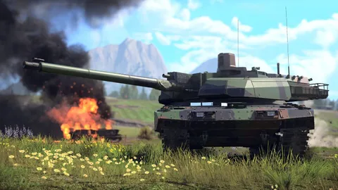 Modern main battle tank on a grassy hill with a burning vehicle behind it in War Thunder